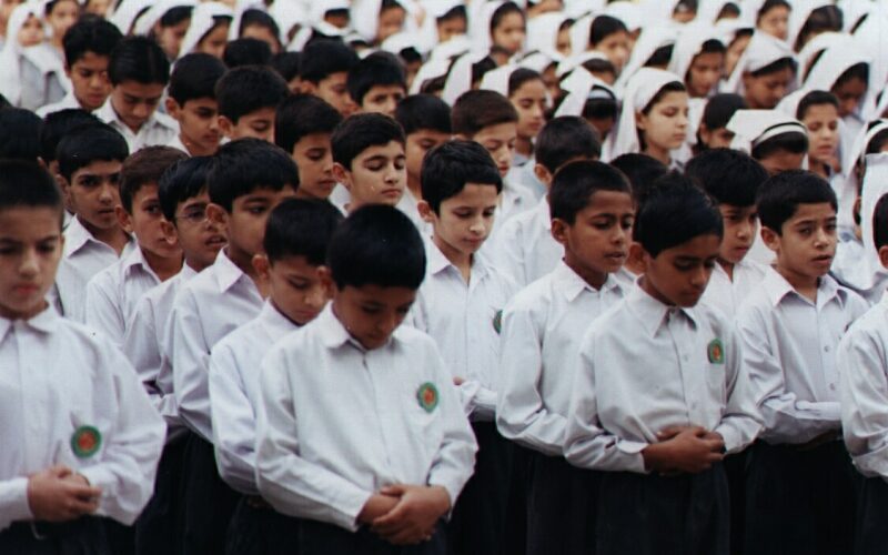 Boys saying a prayer